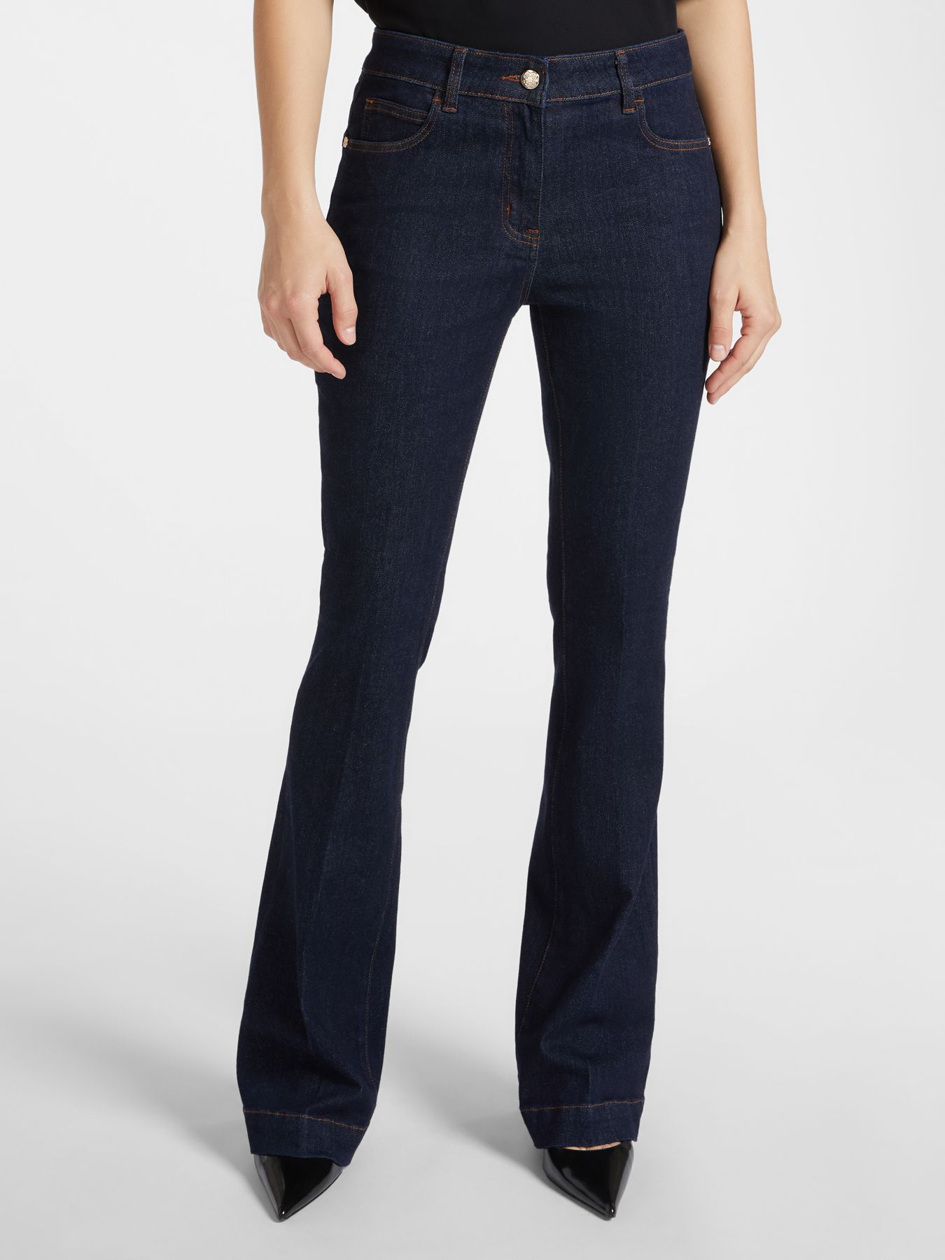 Джинсы расклешенные