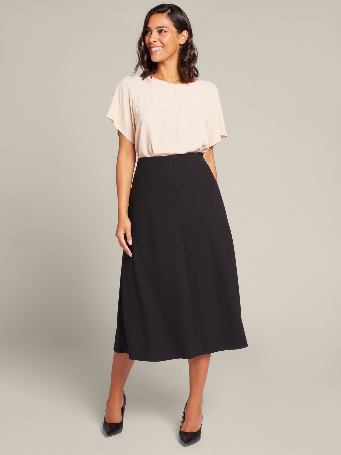 Расклешенная юбка-миди из эко-твила